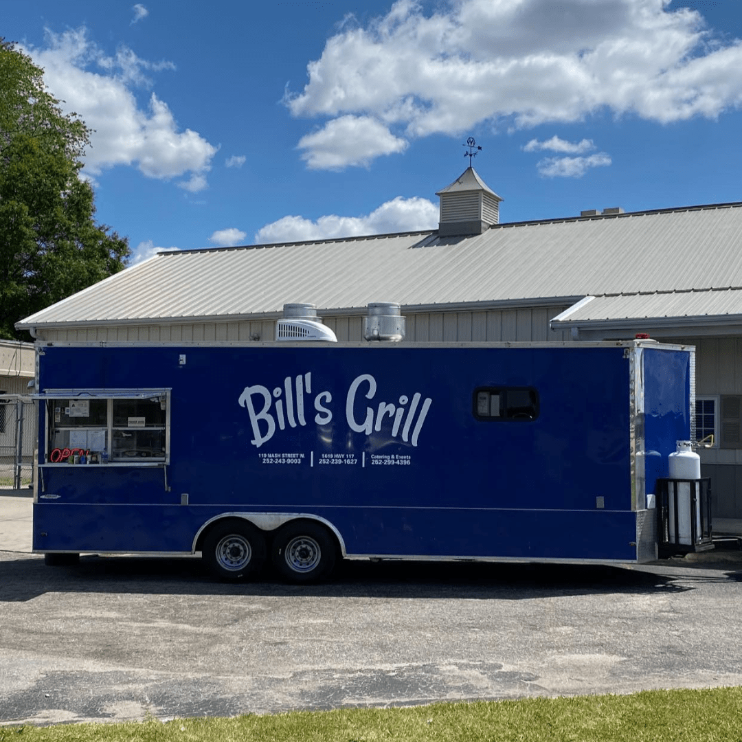 Bill's Grill food truck serving a variety of delicious meals to customers